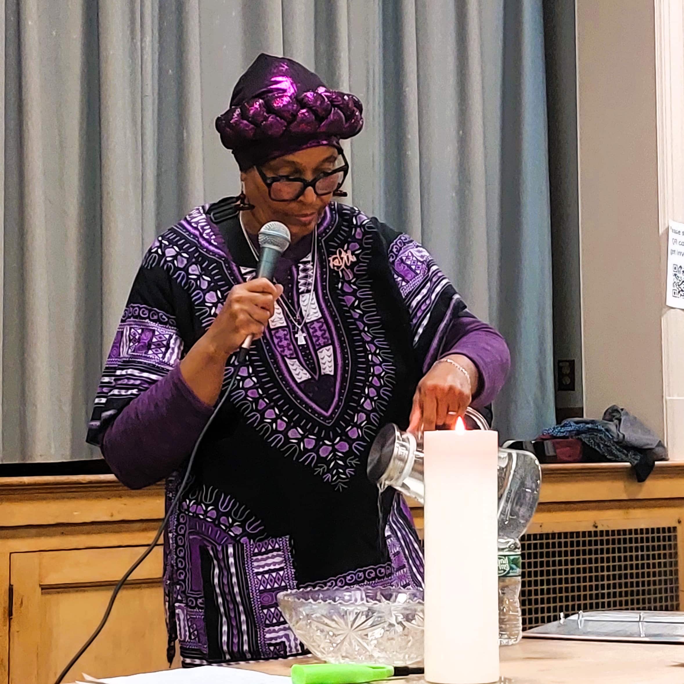 Community prays at multi-faith vigil for people targeted by ICE