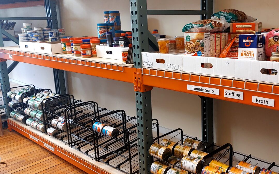 ELHS basketball team collects food, life lessons this December