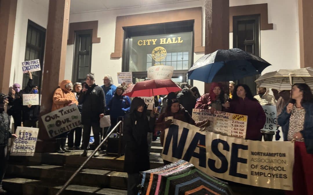 Organizers rally for restored school positions