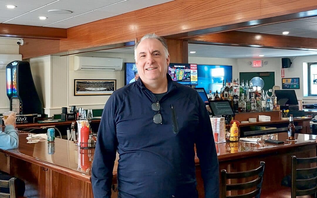 Scoreboard leans into history as neighborhood bar