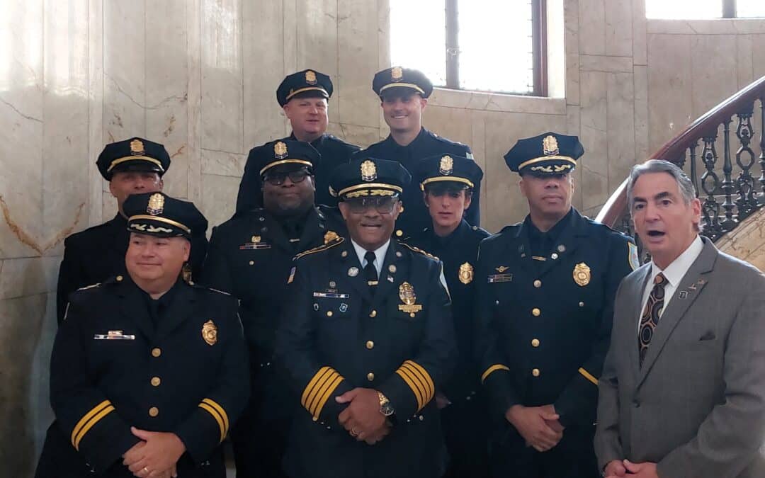 Four SPD officers promoted at City Hall with officials, family