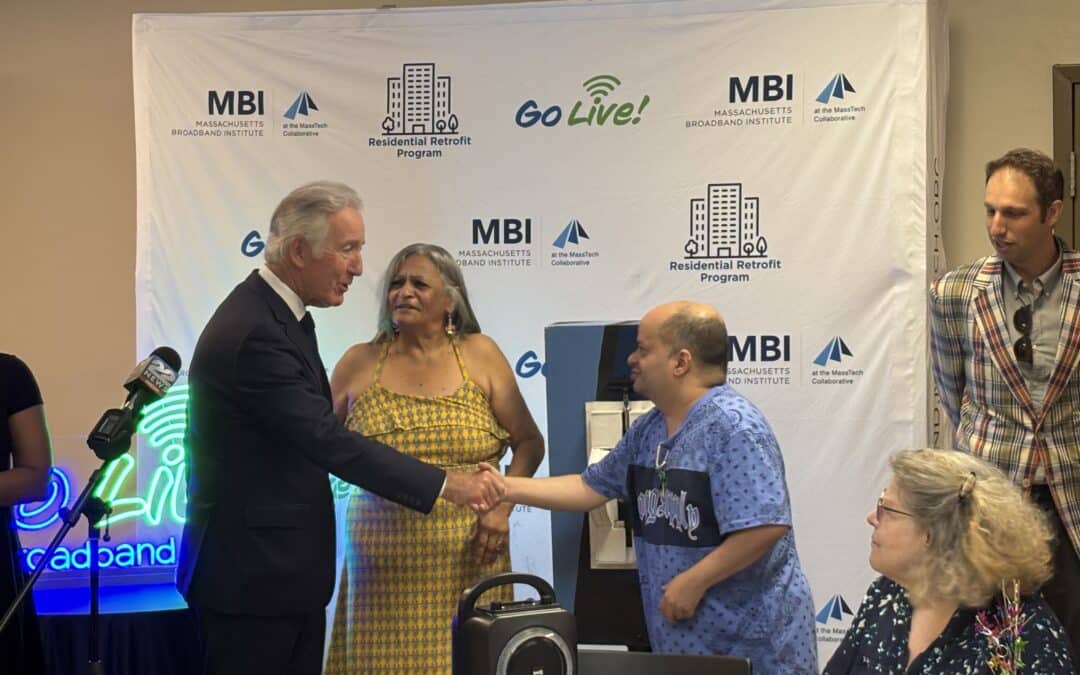 Senior residents celebrate free internet service at Dom Polski apartments