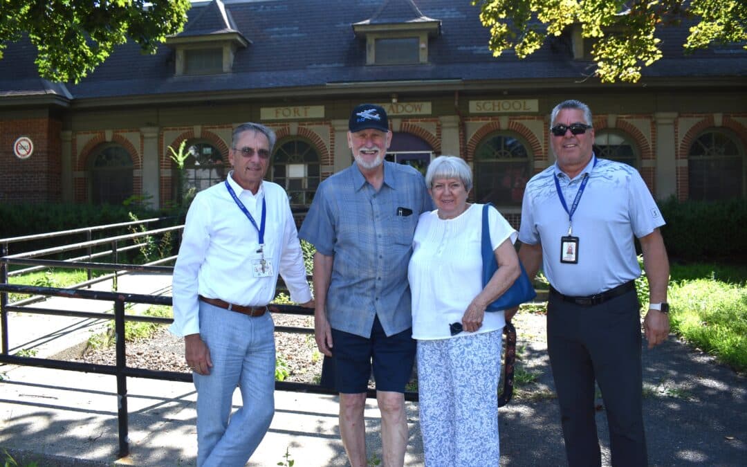 Former students attend Fort Meadow walkthrough during bid process