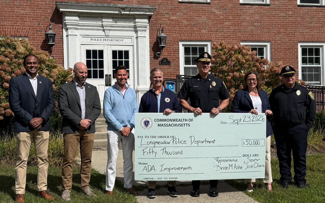 Ashe, Oliveira present Longmeadow Police Department with $50,000 check